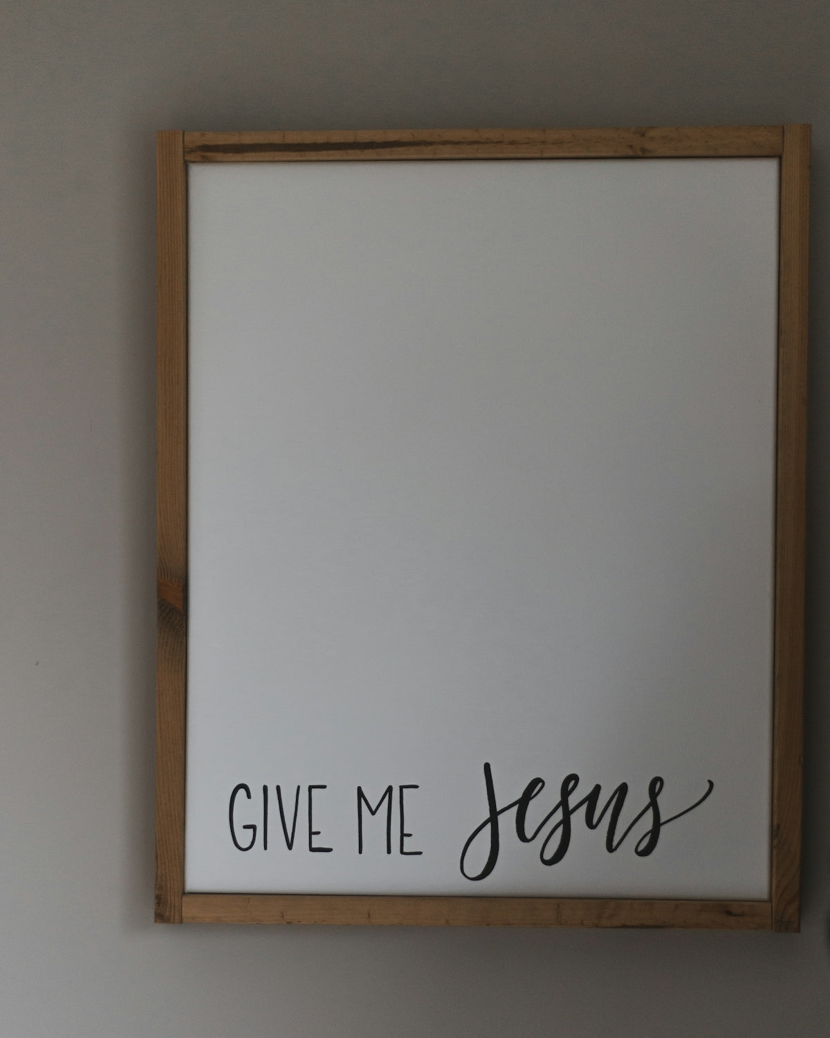 brown wooden framed white board